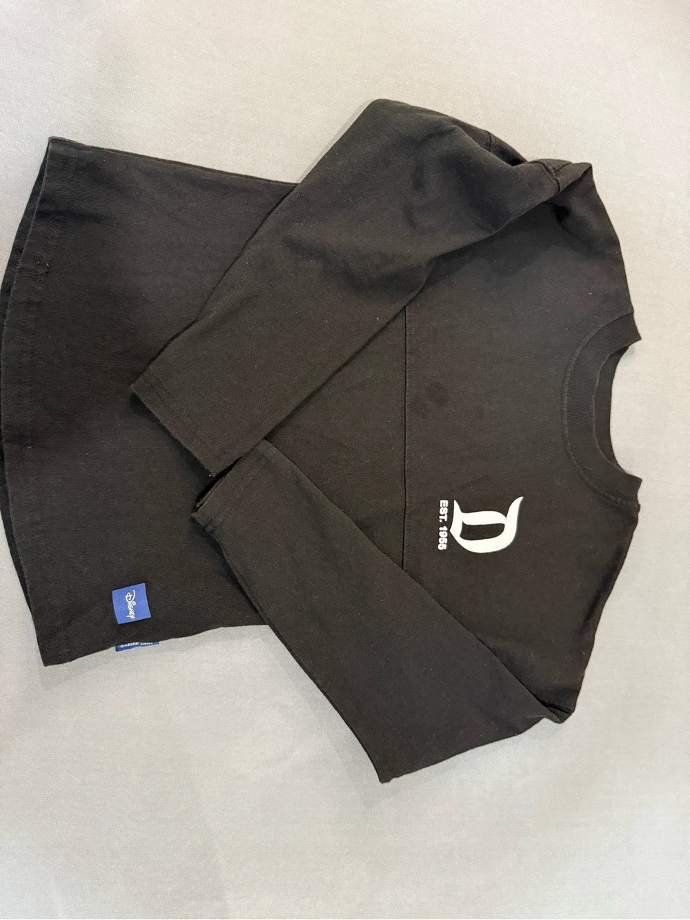 Disney Black Long Sleeve Tee with White 'D' Logo